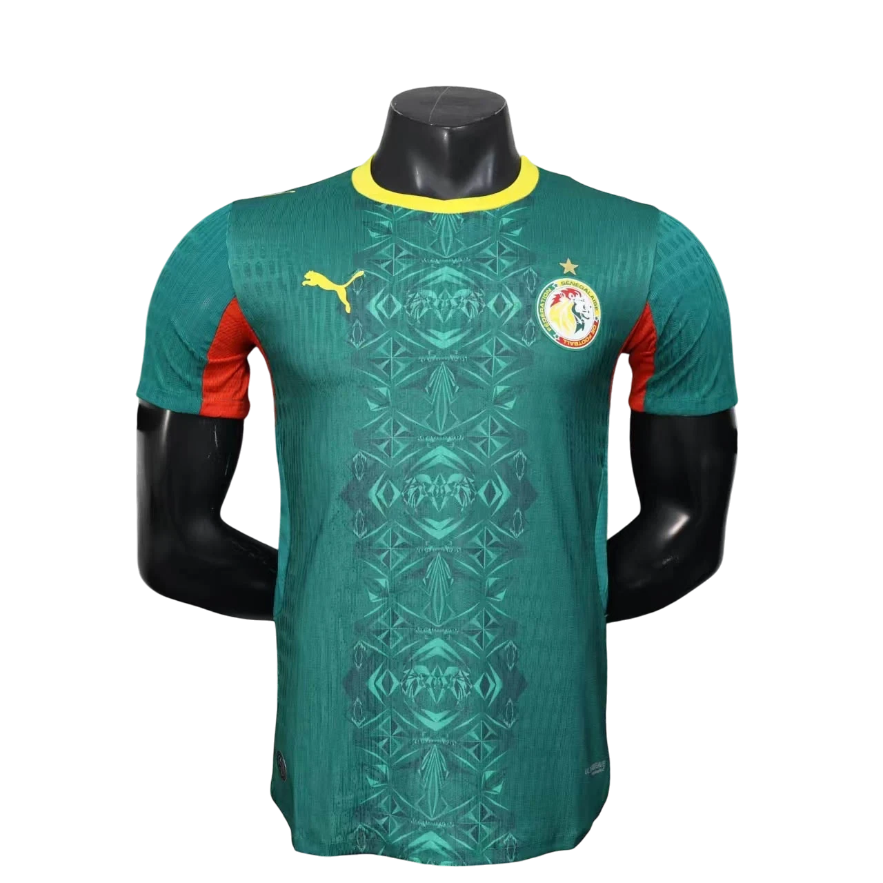 GOATkitz Senegal 2026 player version away jersey in green with yellow trim and red accents. Features a geometric pattern and team crest.