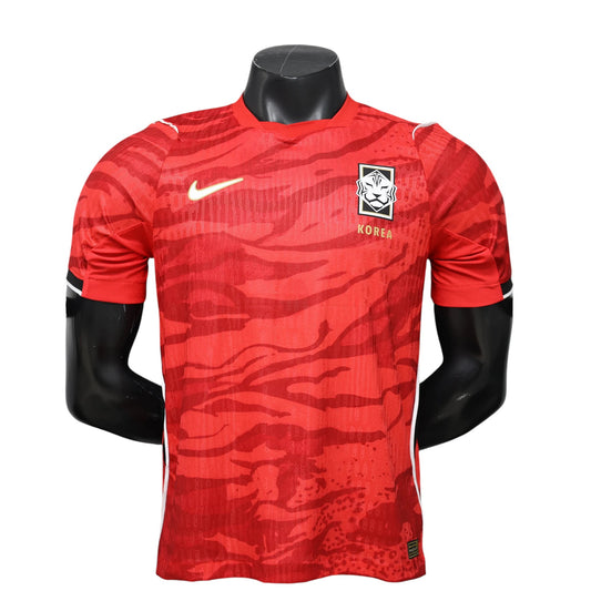 GOATkitz South Korea 2026 Player Version Home Jersey in red with a tiger stripe pattern and white accents.