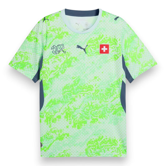 GOATkitz Switzerland 2026 adult away jersey in neon green with abstract mountain print and grey accents. Features Puma logo and Swiss flag.