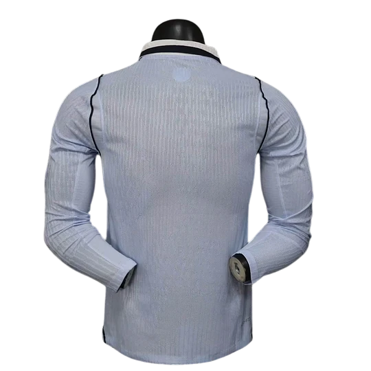 GOATkitz light blue Uruguay 2026 player version long sleeve jersey with pinstripe texture and navy trim.