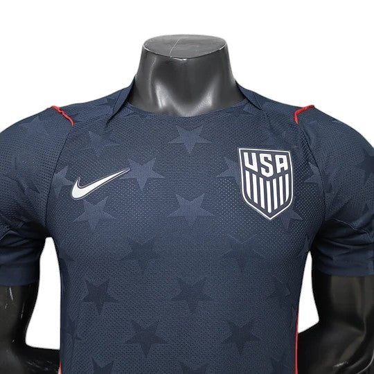 GOATkitz navy blue USA 2026 player version away soccer jersey with white Nike swoosh and USA crest. Features a subtle star pattern.