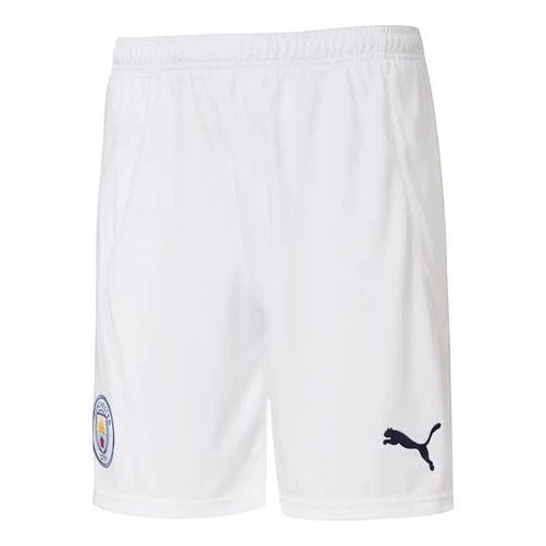 GOATkitz white Manchester City 2025-26 kids home football shorts with navy Puma logo and club crest.